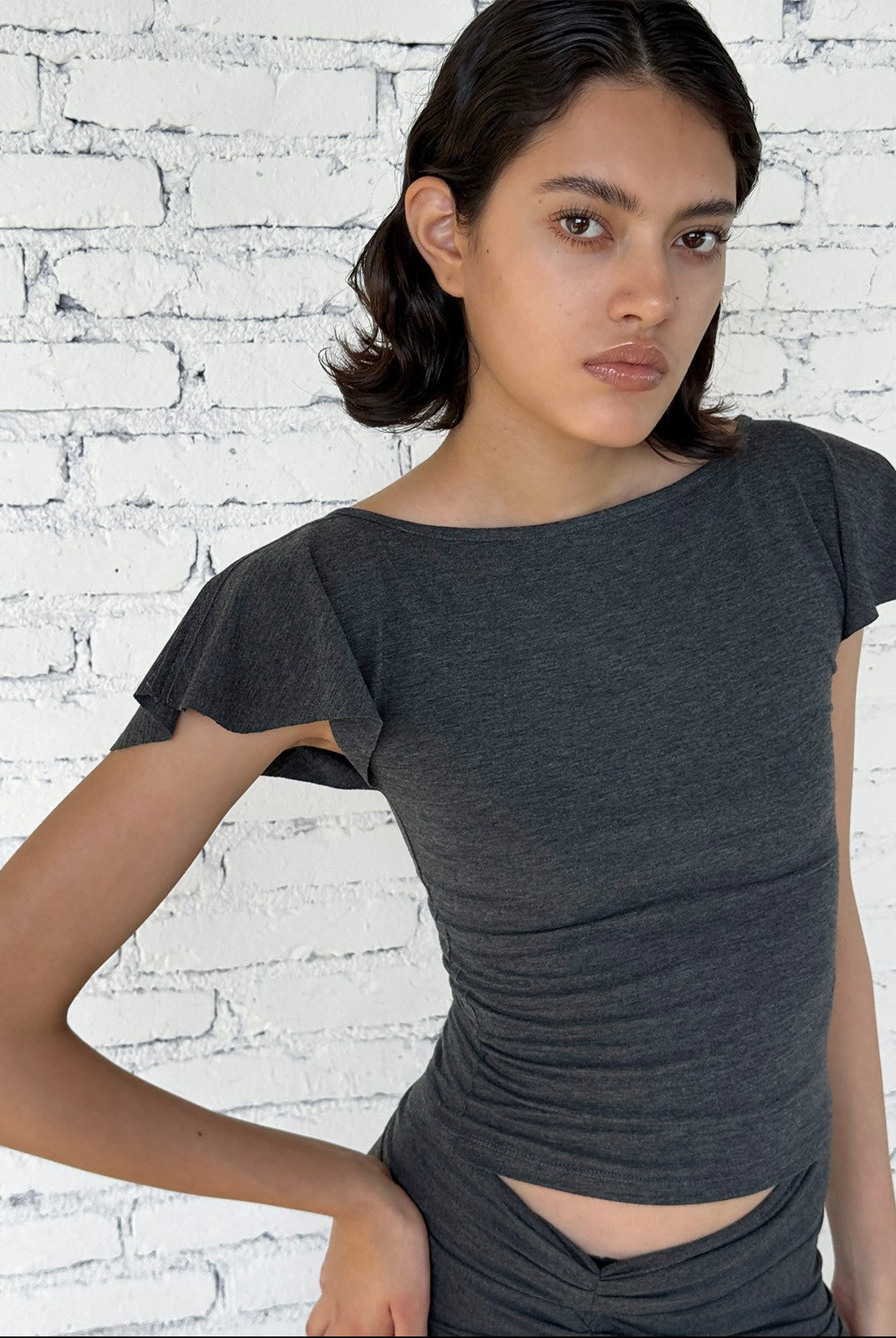 FaxCopyExpress Flutter Sleeve Open Back Top in Gray - On Female Model