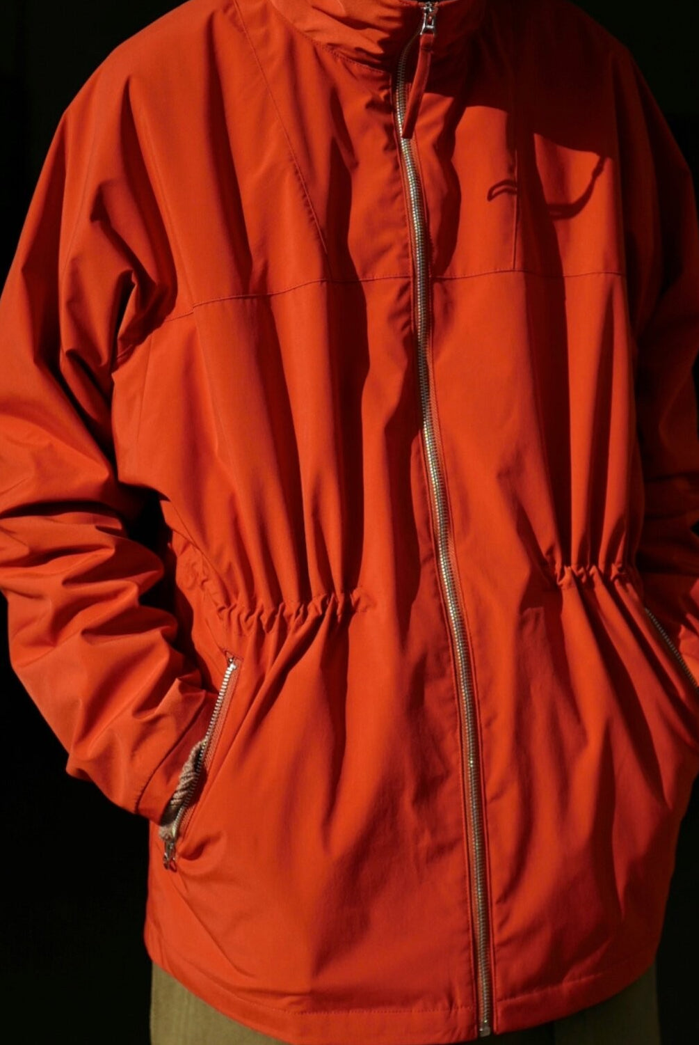 USAGE Drawstring Zip Front Tech Anorak in Orange - On Male Model