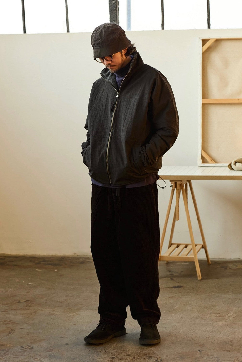 USAGE Reversible Nylon Fleece Track Jacket in Black - On Male Model