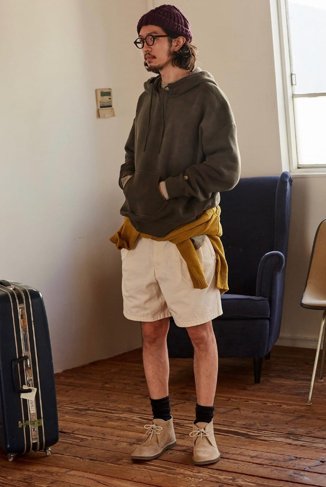 USAGE Faded Vintage Wash Hoodie in Olive - On Male Model