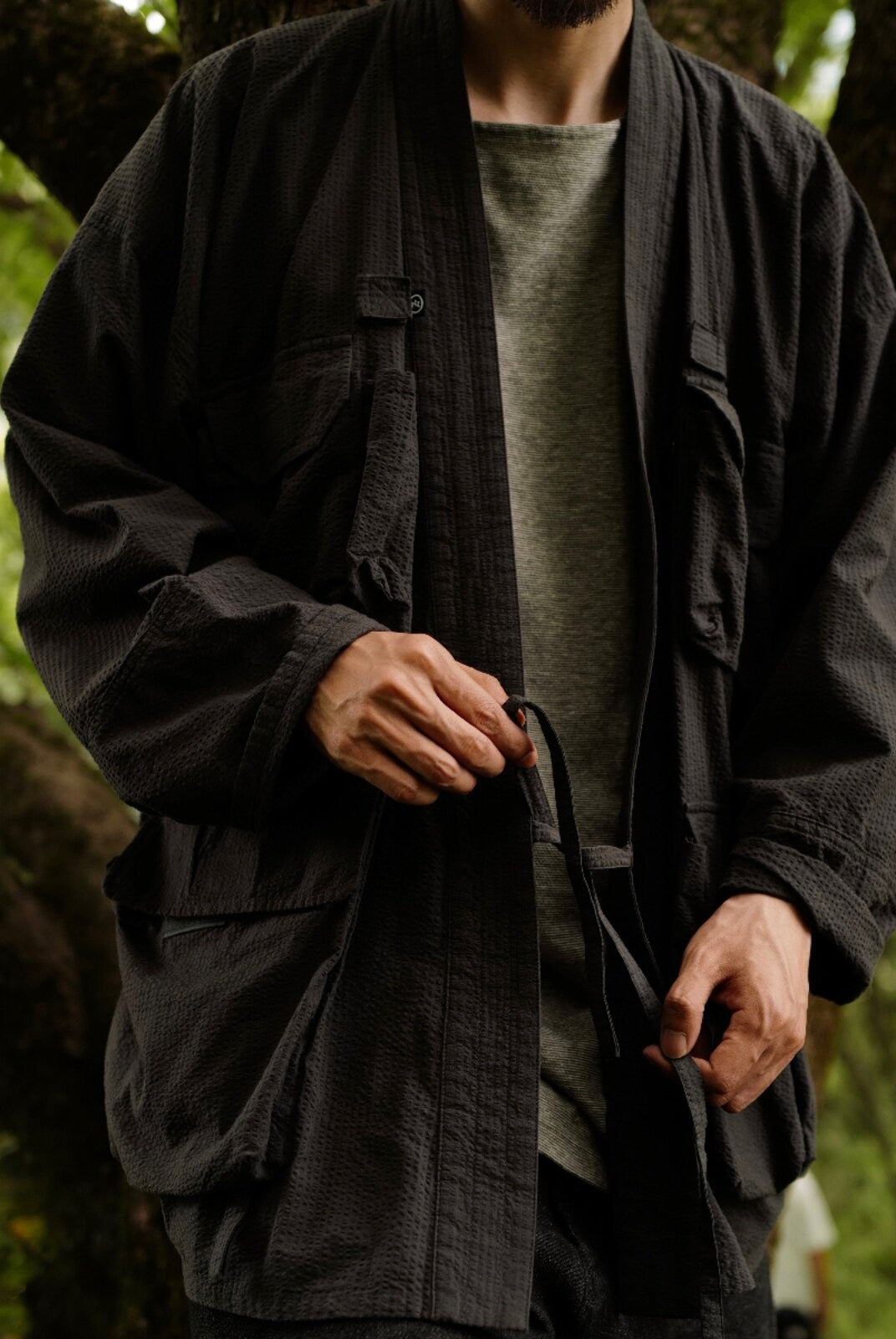 USAGE Reversible Utility Noragi Jacket in Black - On Male Model