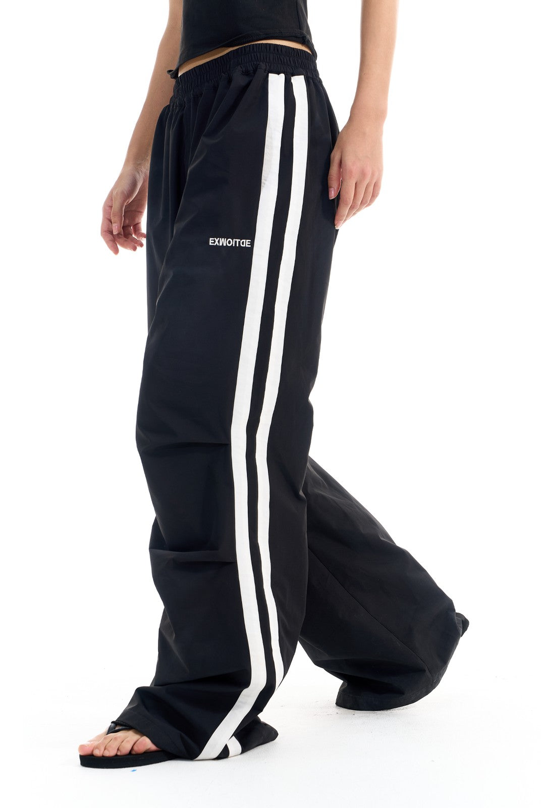 BLINDNOPLAN Striped Pleated Track Pants in Black - On Female Model