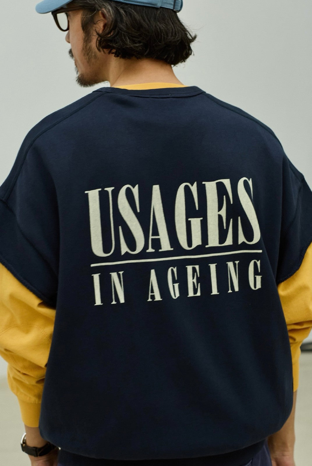 USAGE Raw Edge Cotton Short Sleeve Sweatshirt in Navy Blue - On Male Model