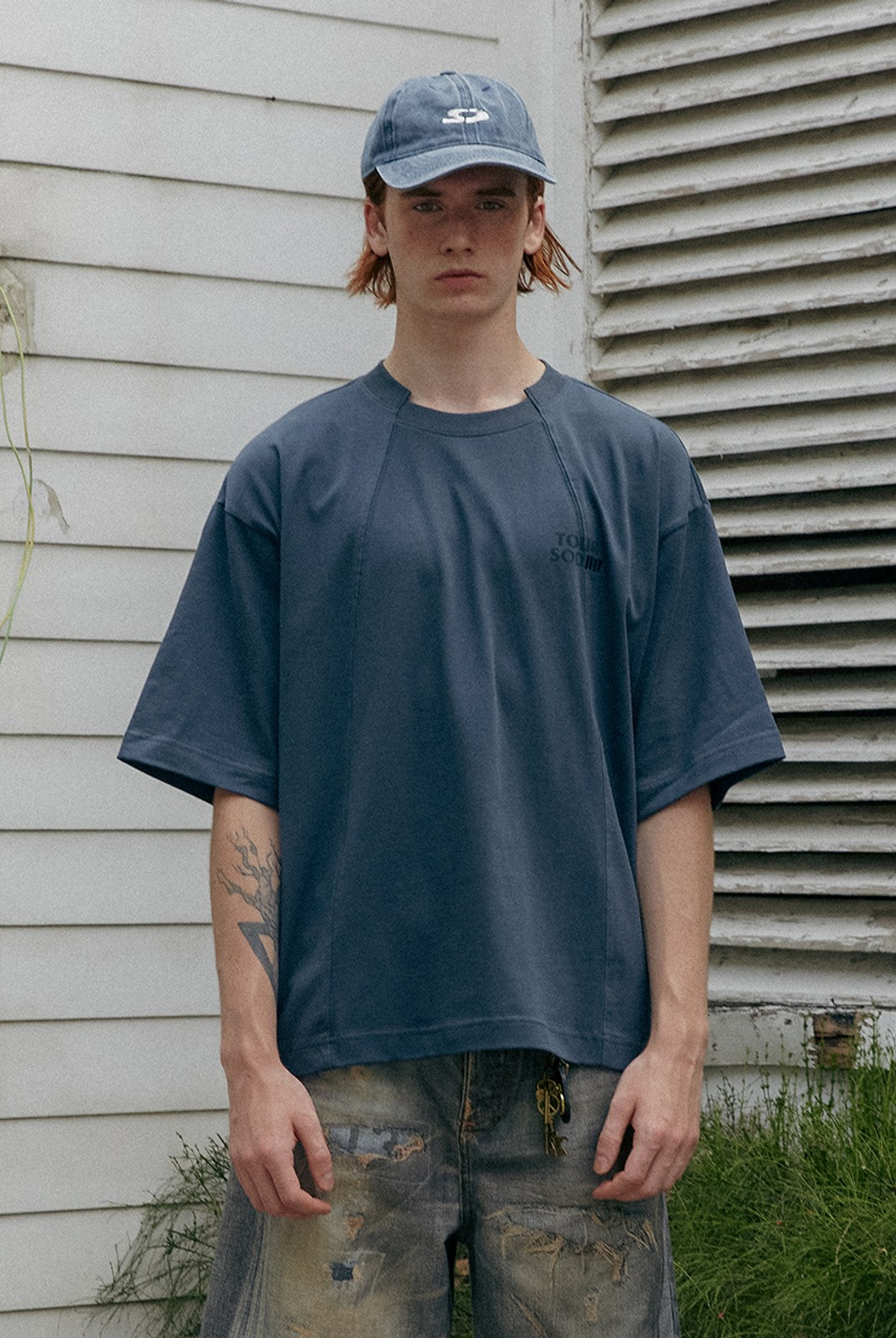 SOD Deconstructed Panel Cotton T Shirt in Teal - On Male Model