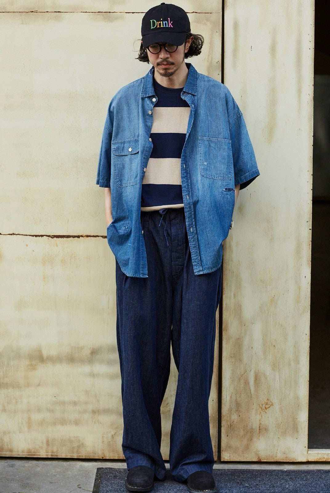 USAGE Distressed Short Sleeve Denim Shirt in Denim - On Male Model