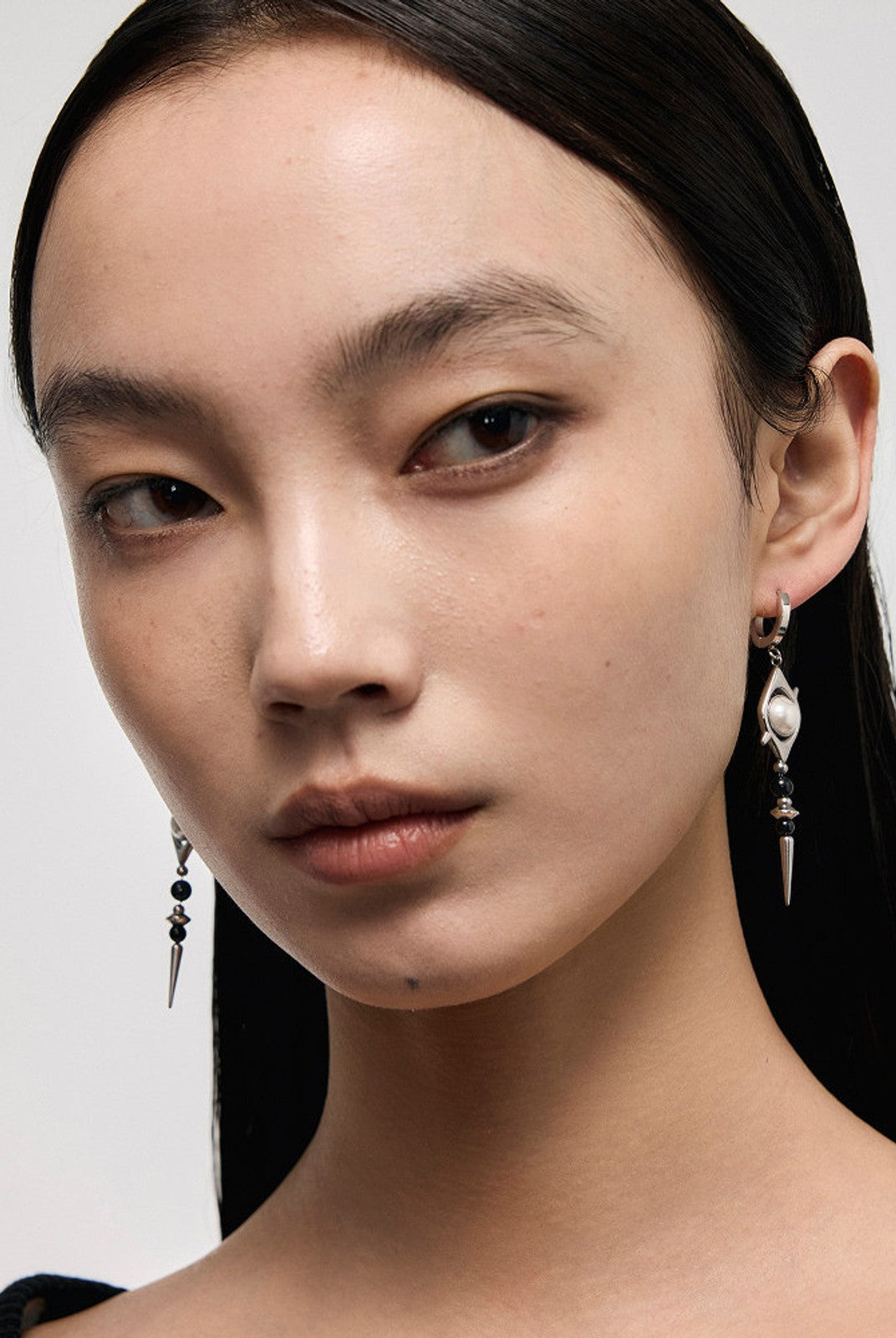 BLACKHEAD Pearl Eye Spike Drop Earrings in Silver - On Female Model
