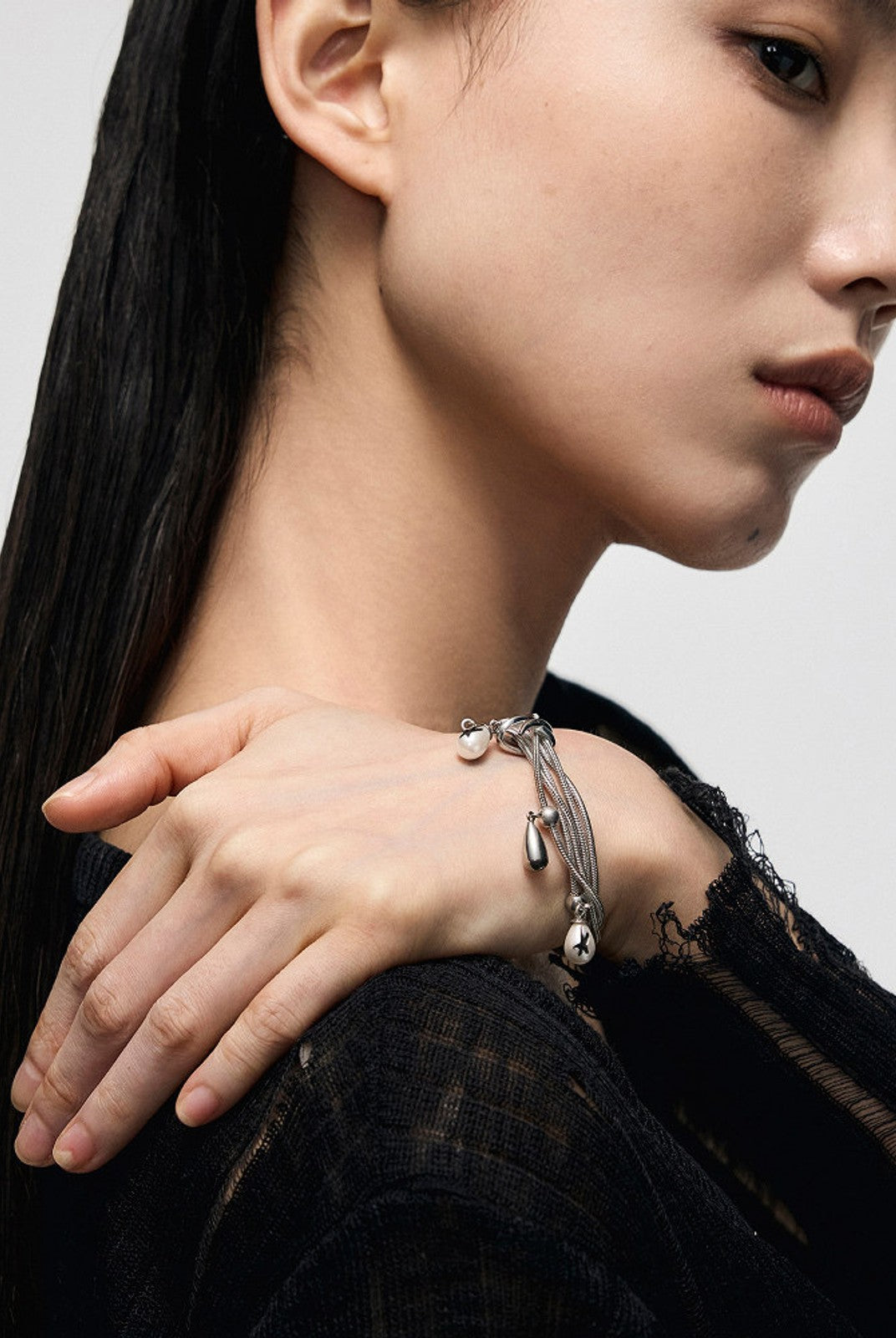 BLACKHEAD Multi Chain Teardrop Pearl Bracelet in Silver - On Female Model