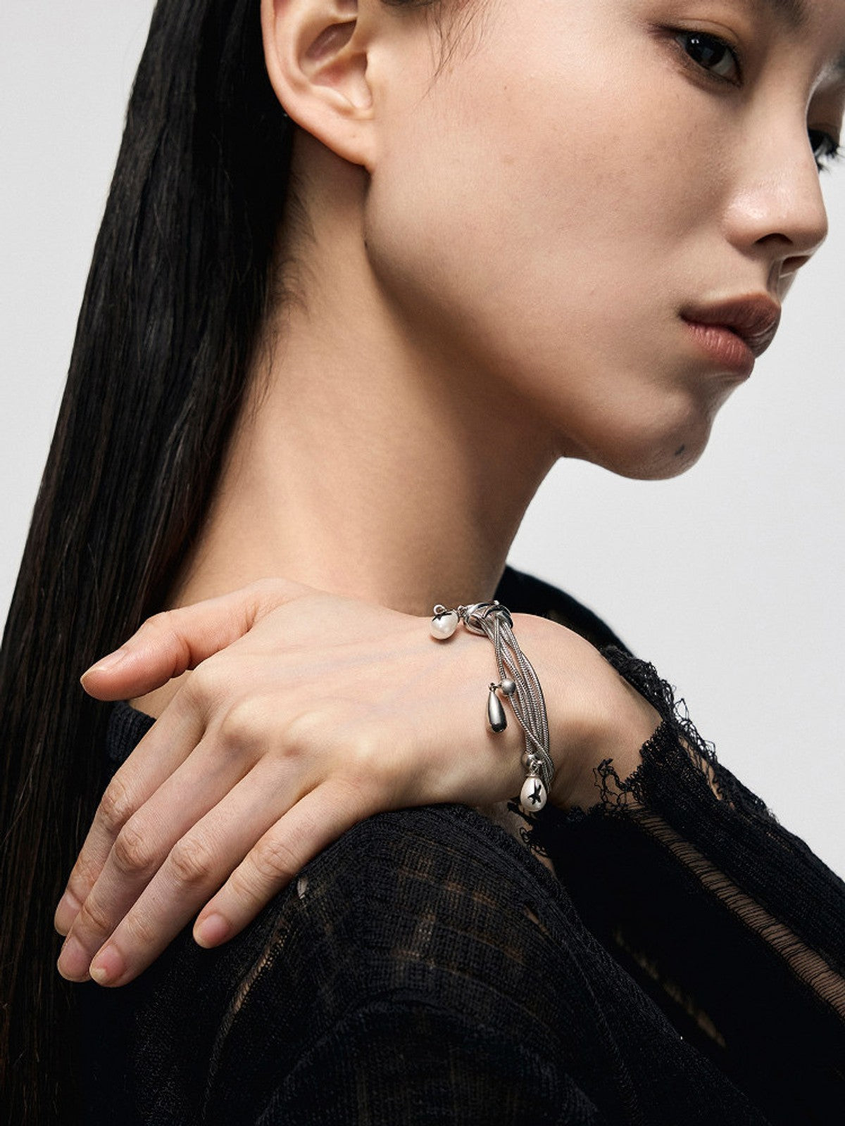 BLACKHEAD Multi Chain Teardrop Pearl Bracelet in Silver - On Female Model