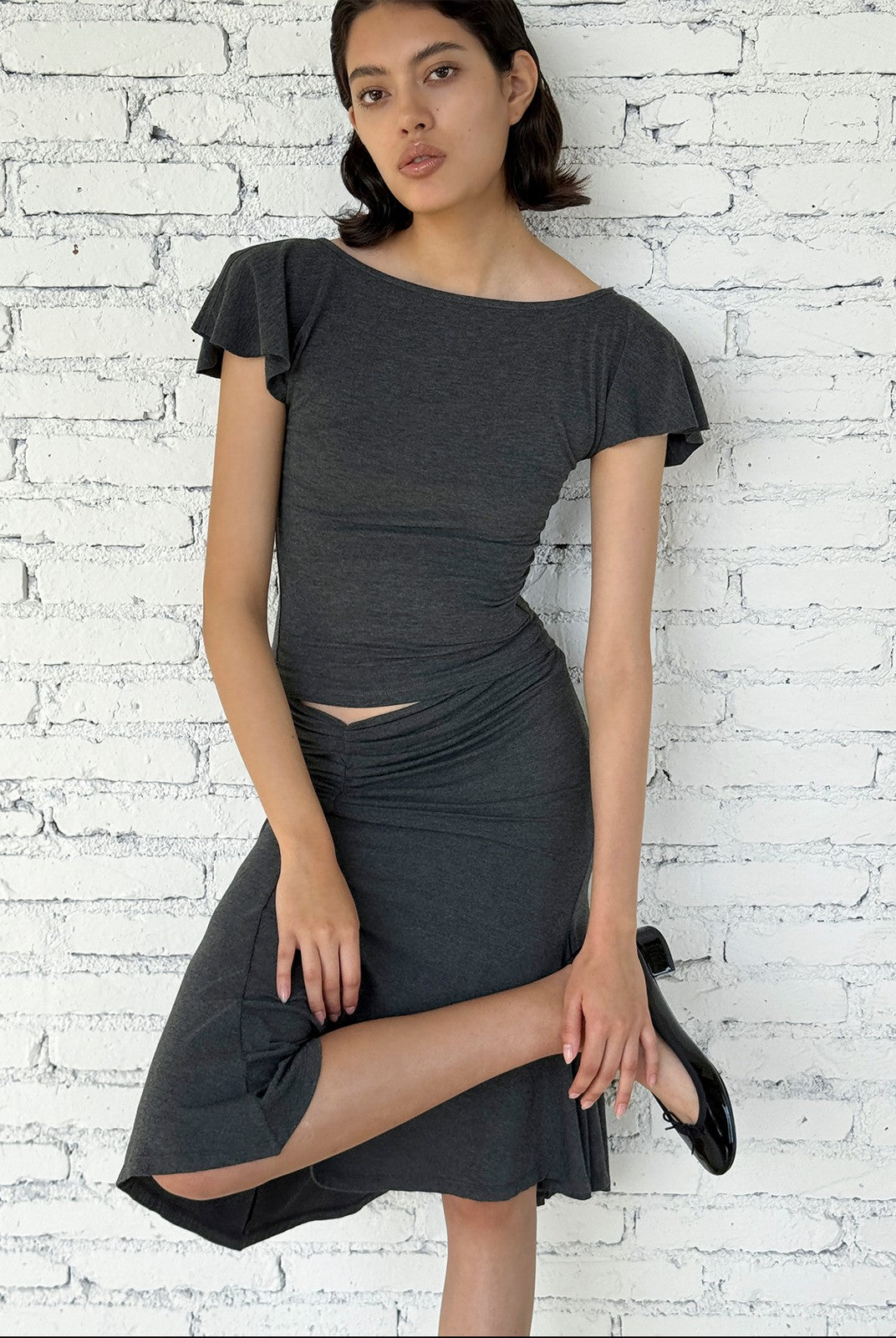 FaxCopyExpress Flutter Sleeve Open Back Top in Gray - On Female Model