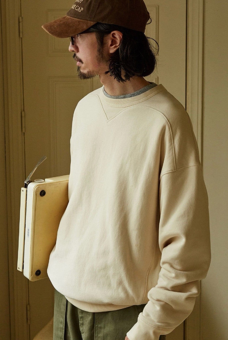 USAGE Reversible Cotton Crewneck Sweatshirt in Cream - On Male Model