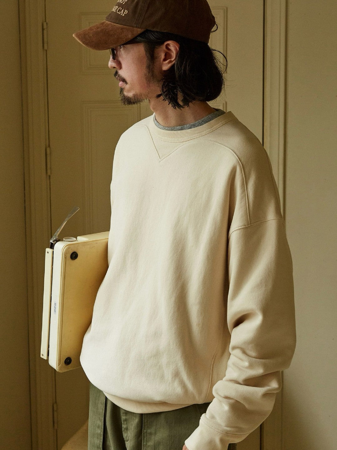 USAGE Reversible Cotton Crewneck Sweatshirt in Cream - On Male Model