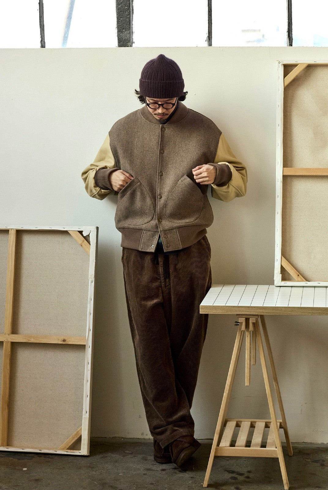 USAGE Reversible Velvet Leather Varsity Jacket in Beige - On Male Model