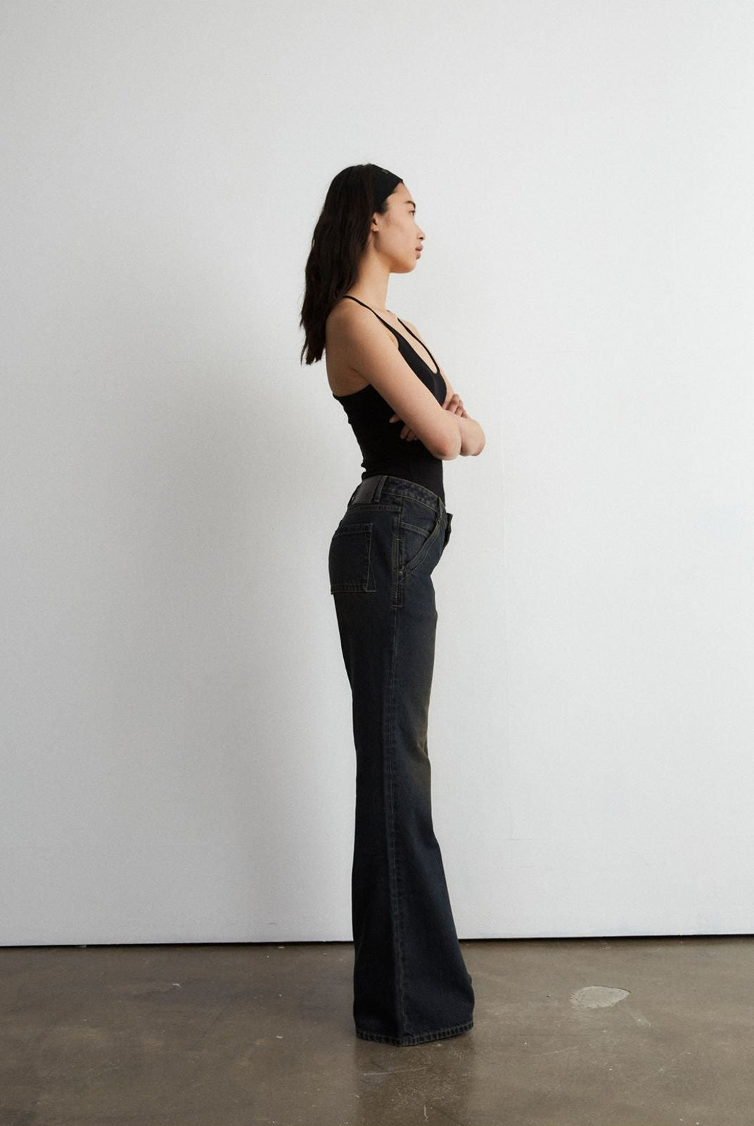 FaxCopyExpress Distressed Slim Flare Jeans in Black - On Female Model