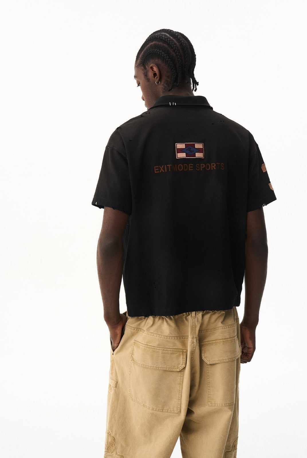 BLINDNOPLAN Distressed Embroidered Cotton Polo in Black - On Model