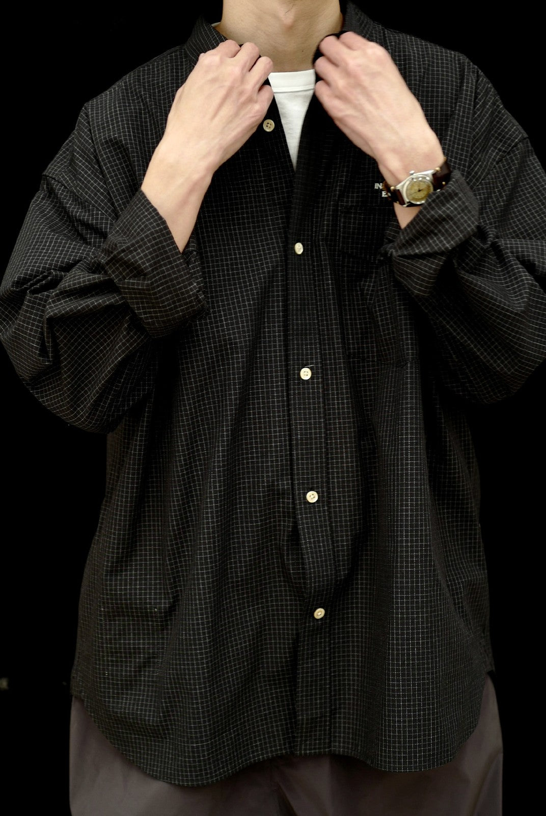 USAGE Oversized Micro Check Button Down Shirt in Black - On Male Model