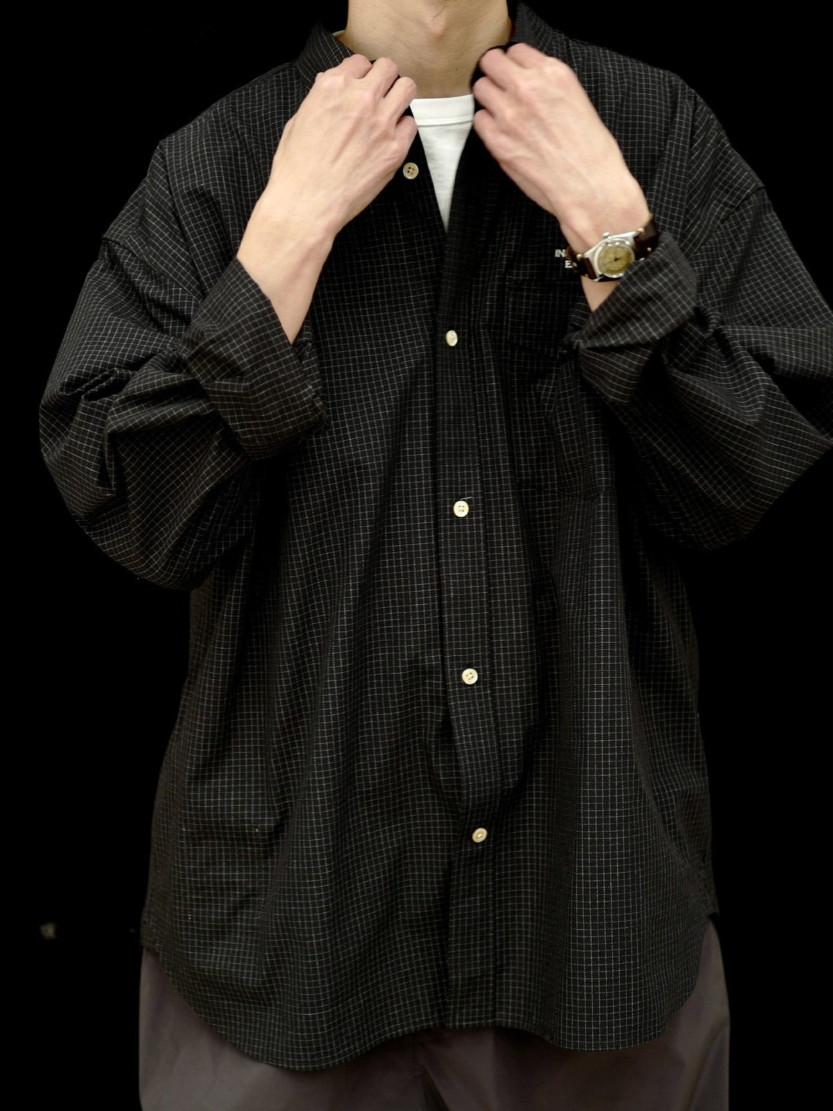 USAGE Oversized Micro Check Button Down Shirt in Black - On Male Model