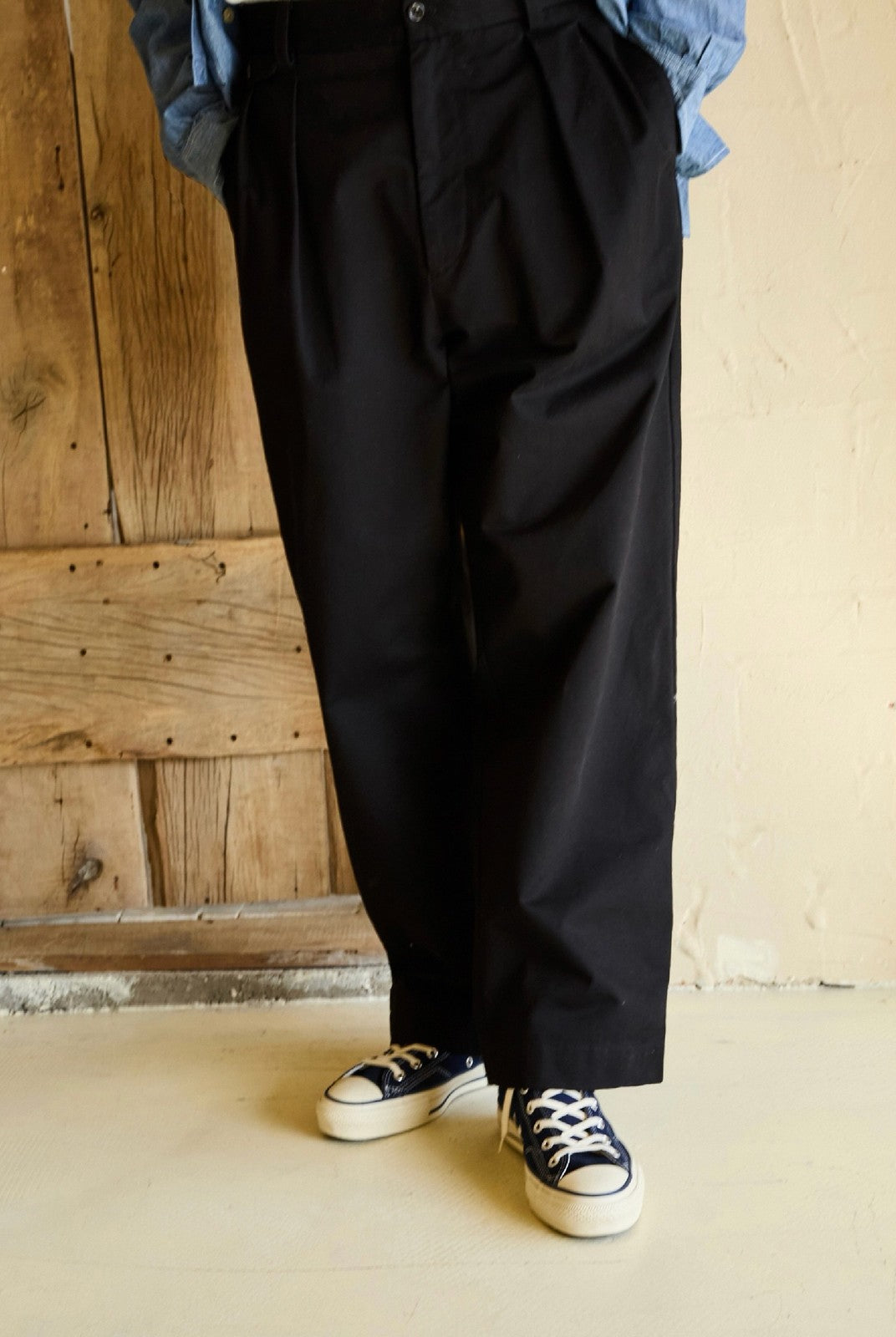 USAGE Pleated Cotton Twill Chinos in Black - On Model