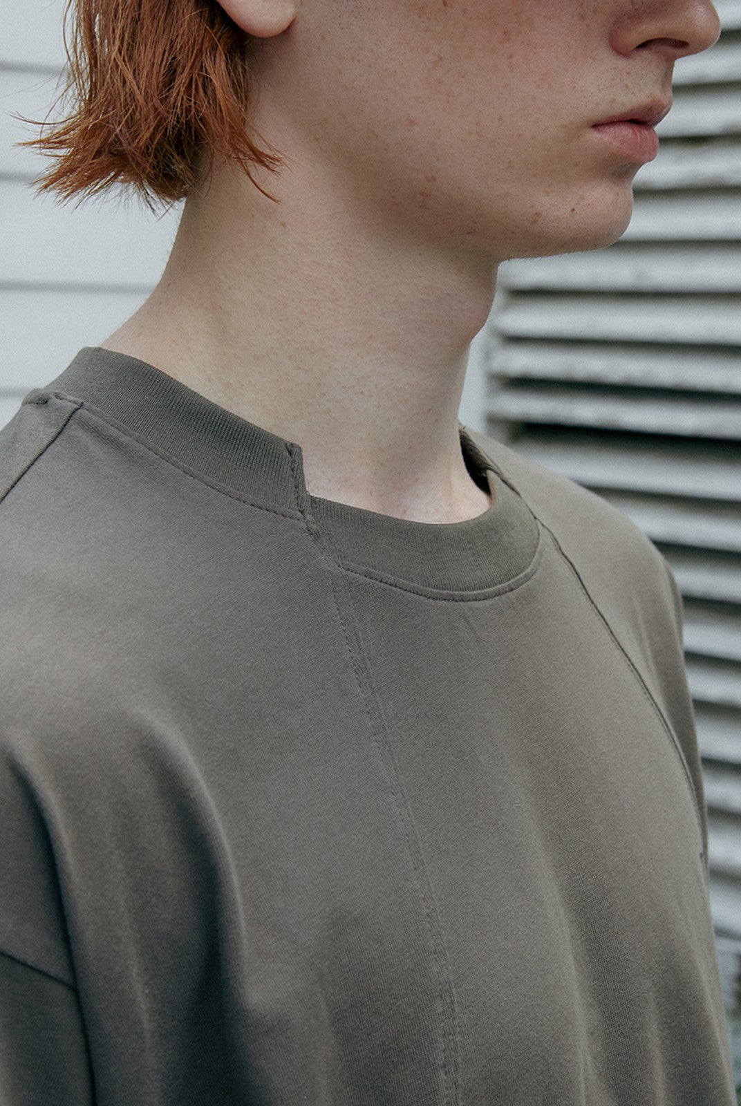 SOD Deconstructed Panel Cotton T Shirt in Olive - On Male Model