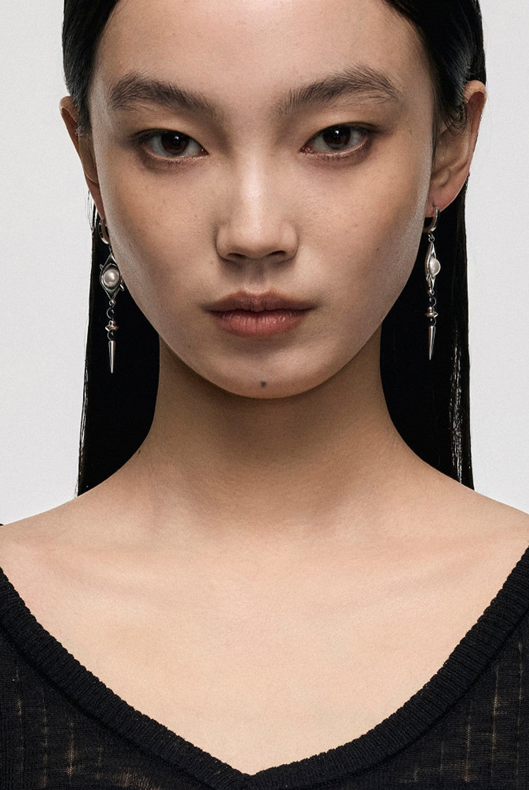 BLACKHEAD Pearl Eye Spike Drop Earrings in Silver - On Female Model