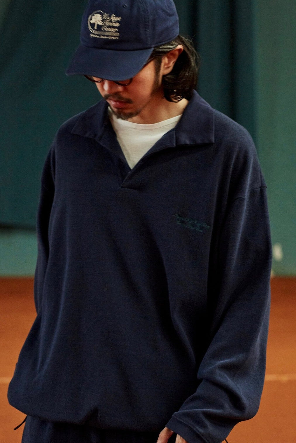 USAGE Oversized Textured Long Sleeve Polo in Navy Blue - On Male Model