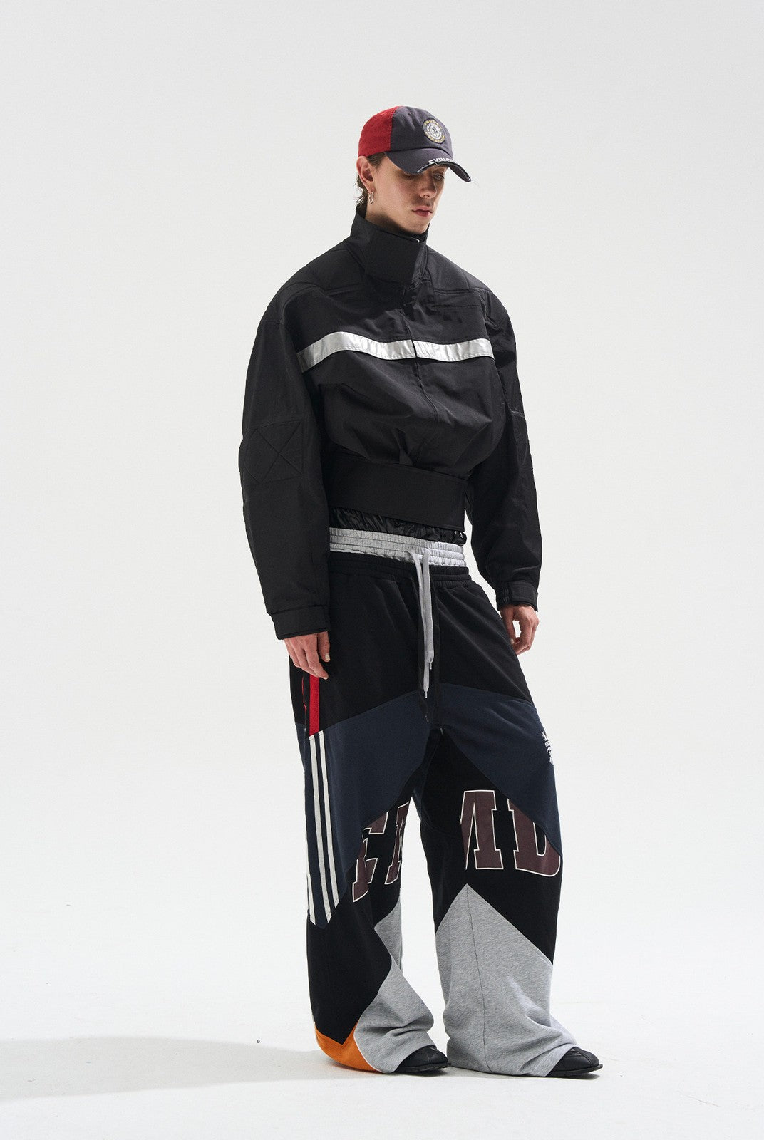 BLINDNOPLAN Reflective Strip Stand Collar Jacket in Black - On Male Model