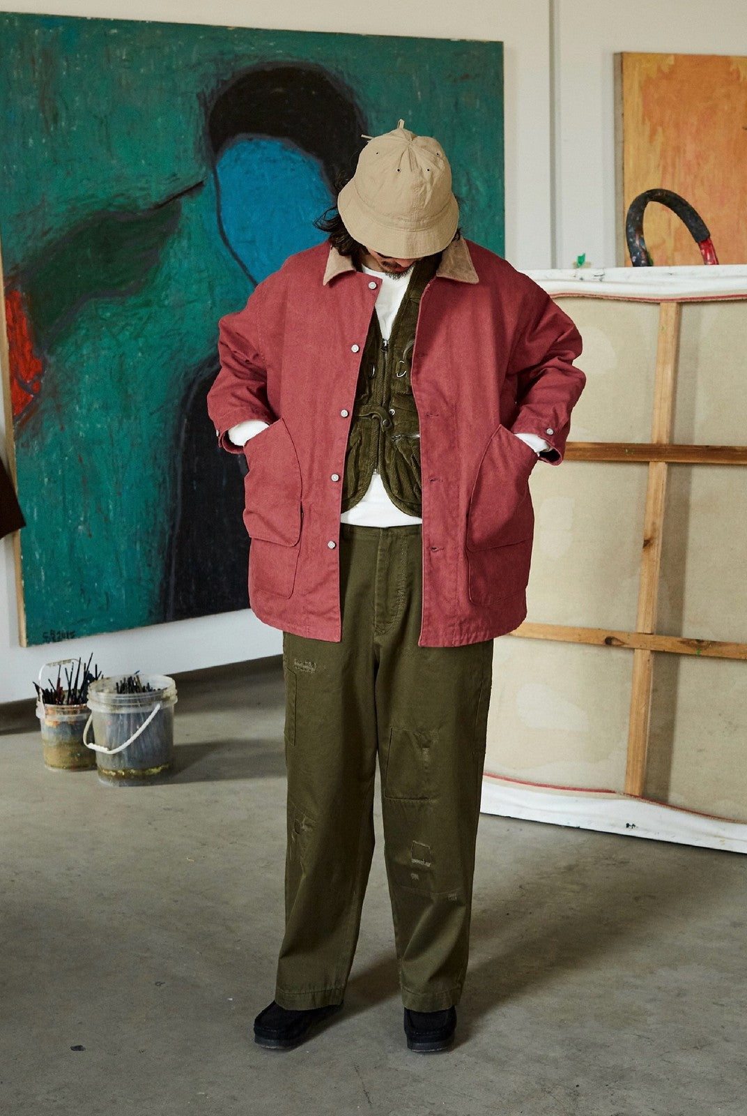 USAGE Hand Distressed Patched Chinos in Olive - On Male Model