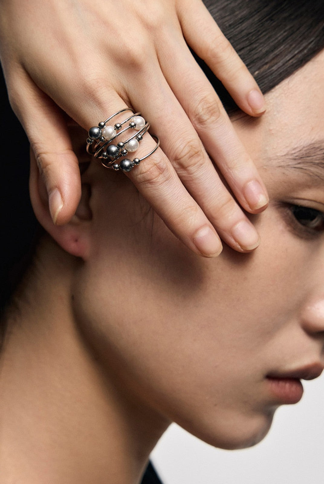 BLACKHEAD Entwined Pearl Steel Ring in Silver - On Female Model