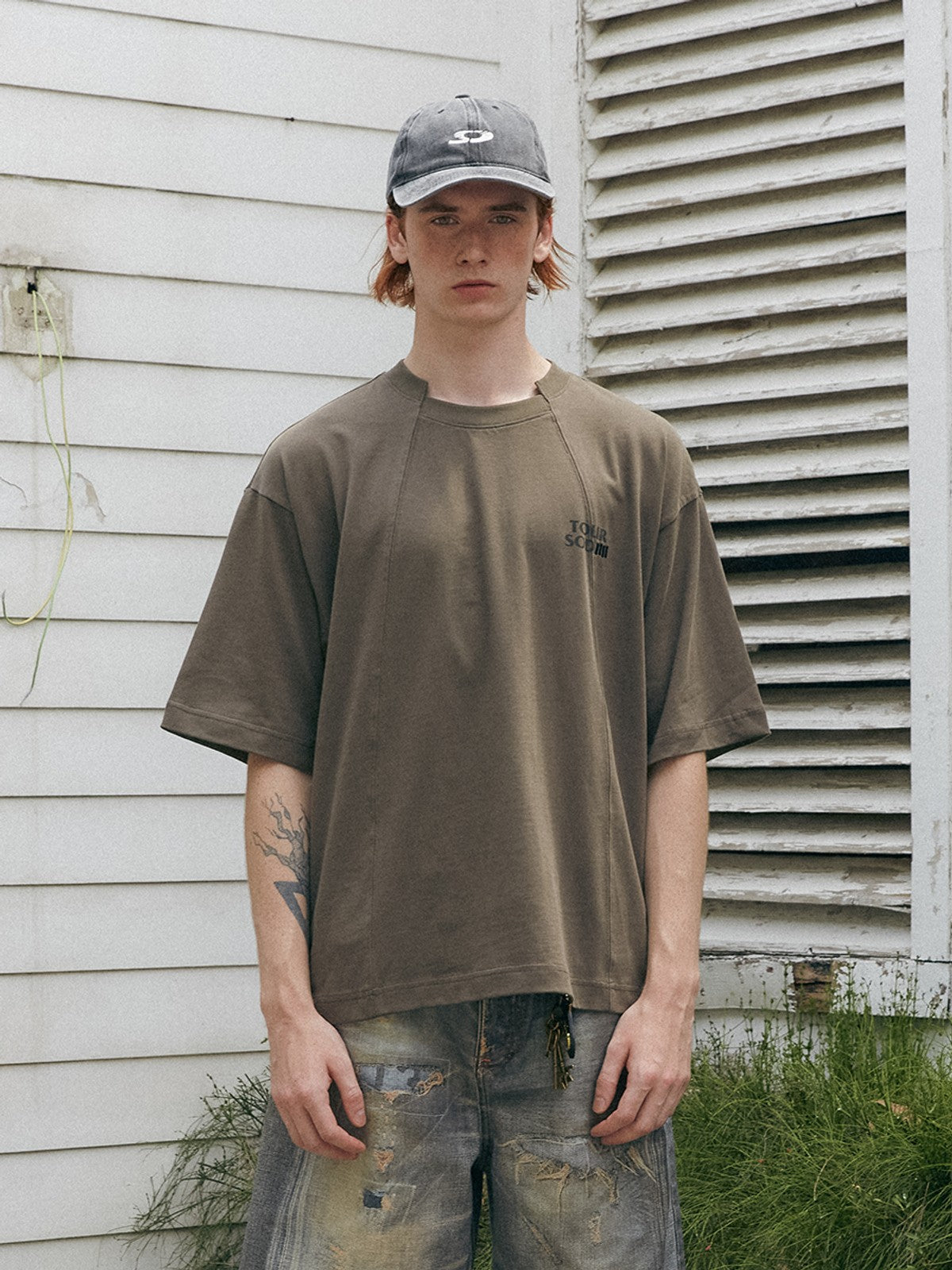 SOD Deconstructed Panel Cotton T Shirt in Olive - On Male Model