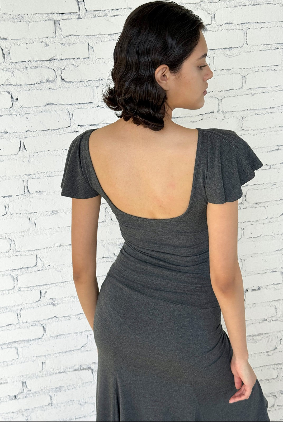 FaxCopyExpress Flutter Sleeve Open Back Top in Gray - On Female Model