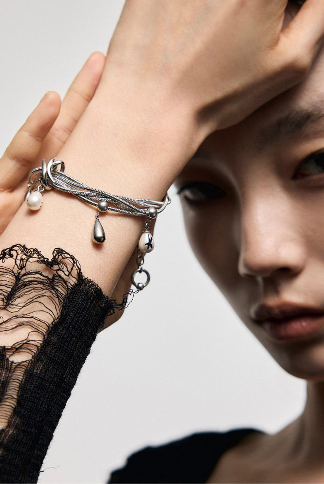 BLACKHEAD Multi Chain Teardrop Pearl Bracelet in Silver - On Female Model