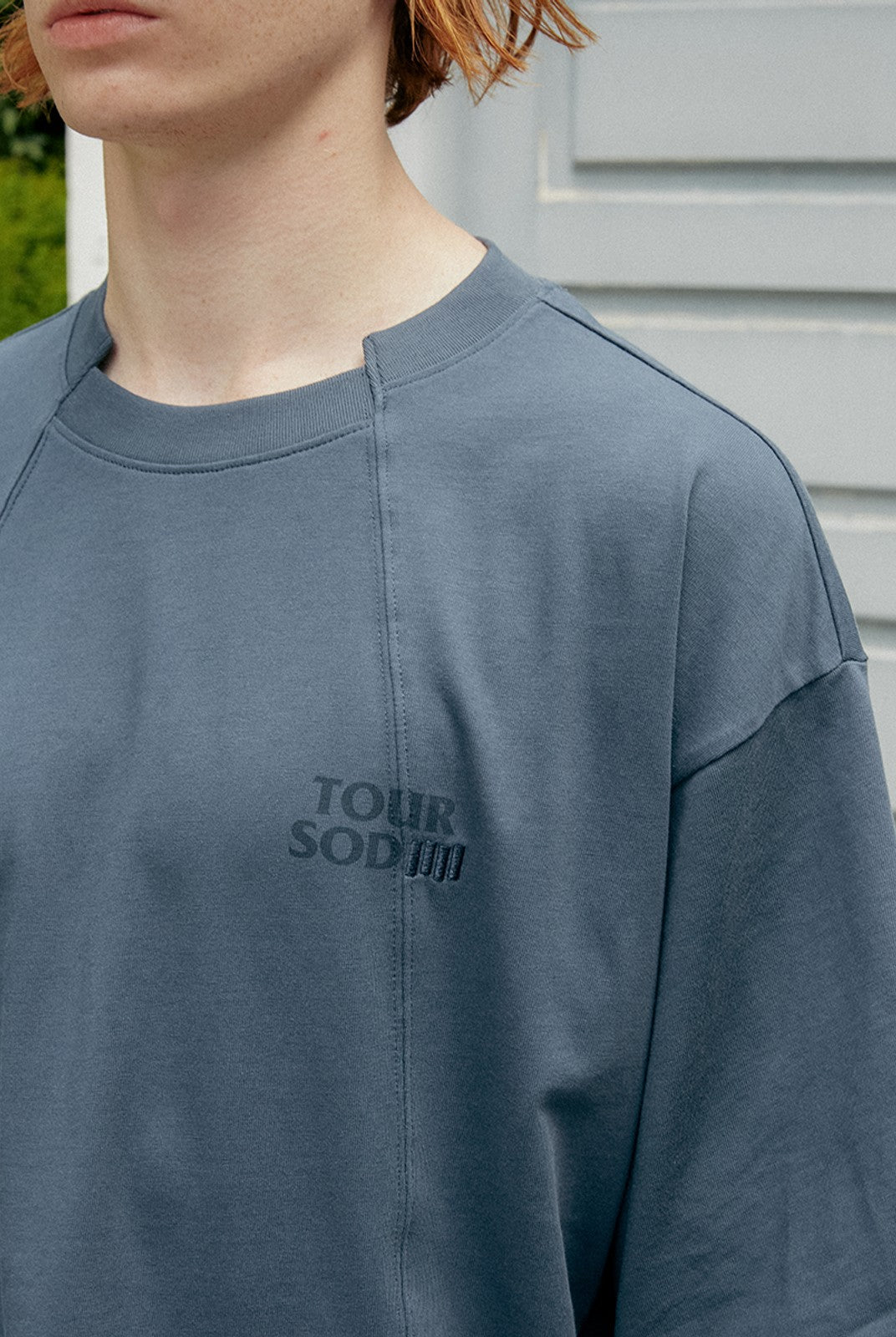 SOD Deconstructed Panel Cotton T Shirt in Teal - On Male Model