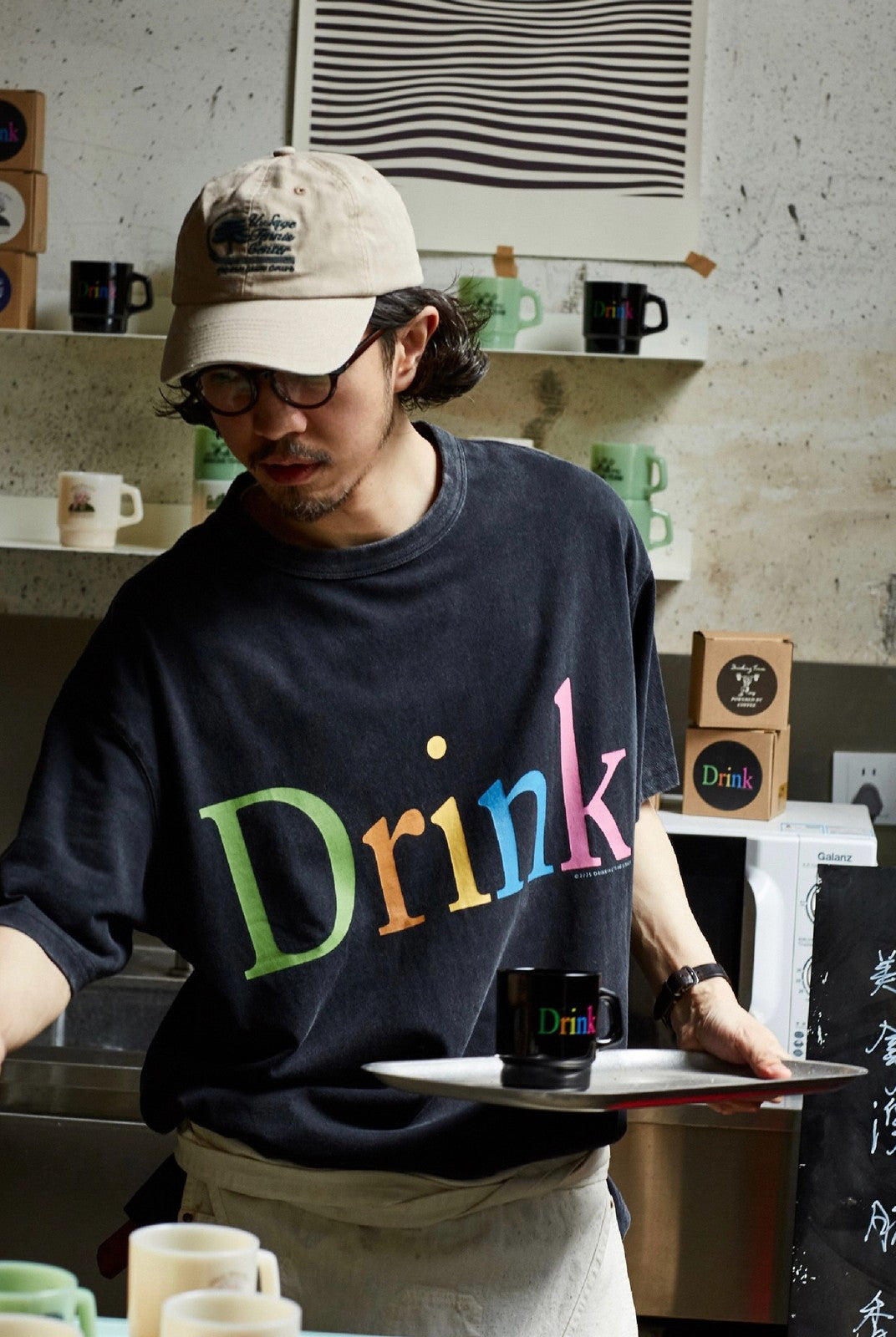 USAGE Faded Rainbow Logo T Shirt in Black - On Male Model