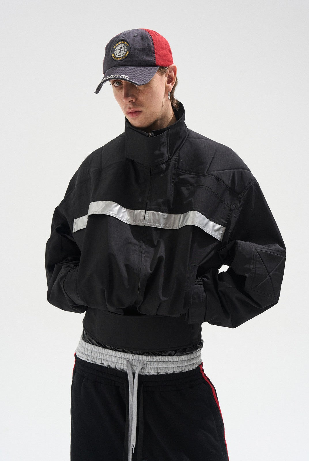 BLINDNOPLAN Reflective Strip Stand Collar Jacket in Black - On Male Model