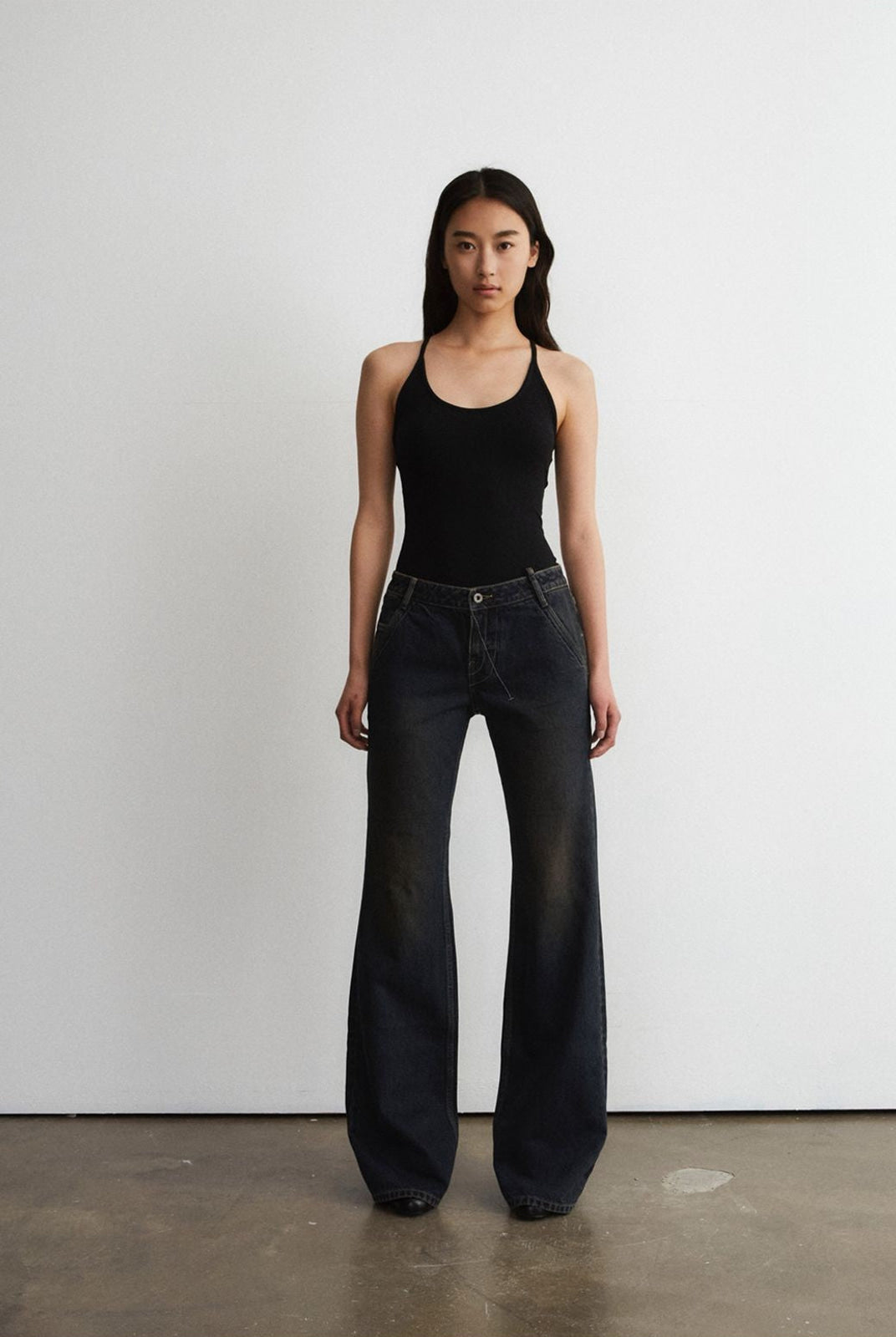 FaxCopyExpress Distressed Slim Flare Jeans in Black - On Female Model