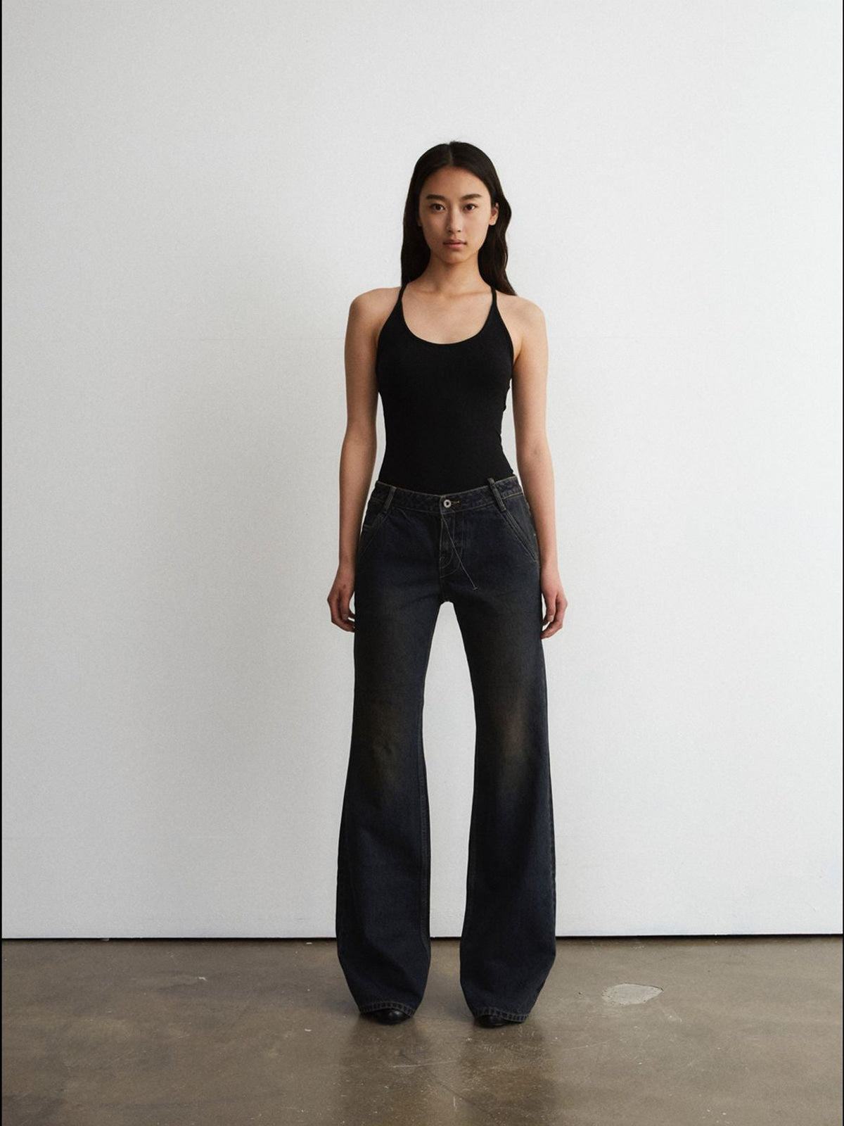 FaxCopyExpress Distressed Slim Flare Jeans in Black - On Female Model