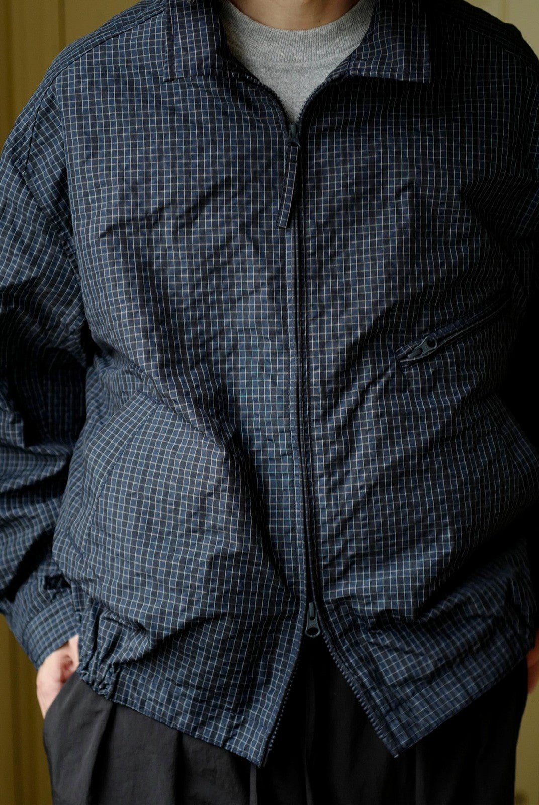 USAGE Jacquard Check Harrington Jacket in Navy Blue - On Male Model