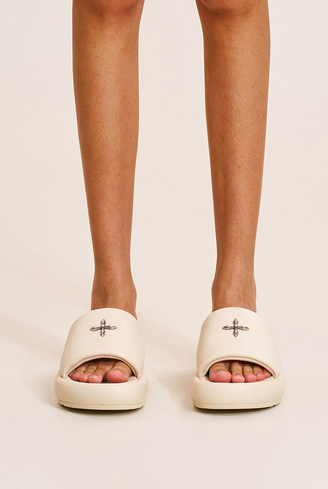 SMFK Cowhide Leather Cross Hardware Slides in Cream - On Female Model