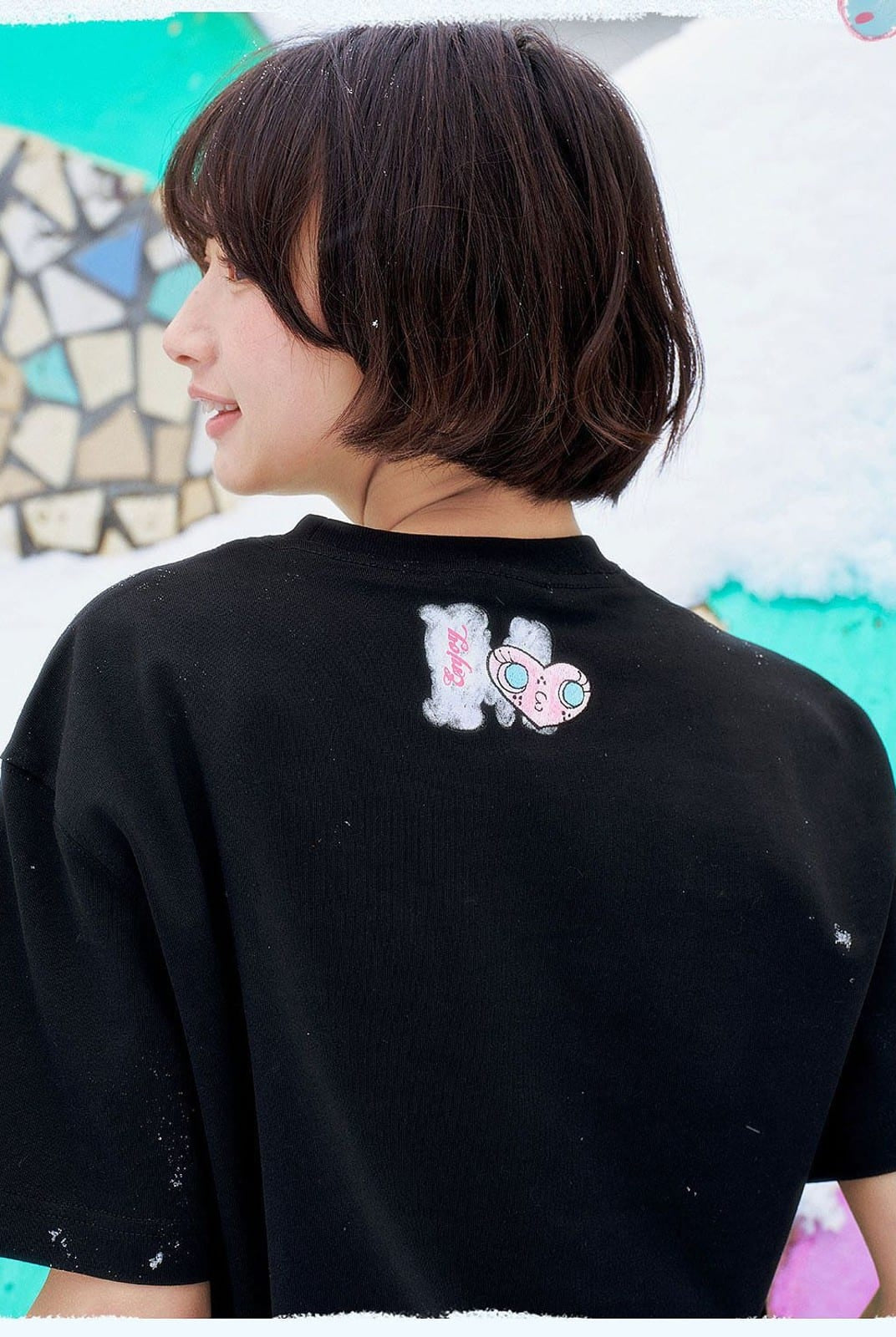 MEDM Embroidered Heart Cotton T Shirt in Black - On Female Model