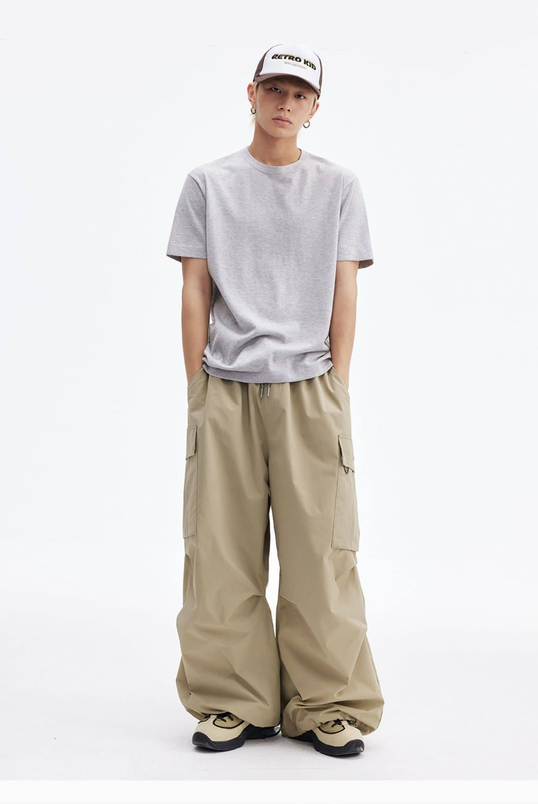 MEDM Multi Pocket Parachute Cargo Pants in Beige - On Male Model