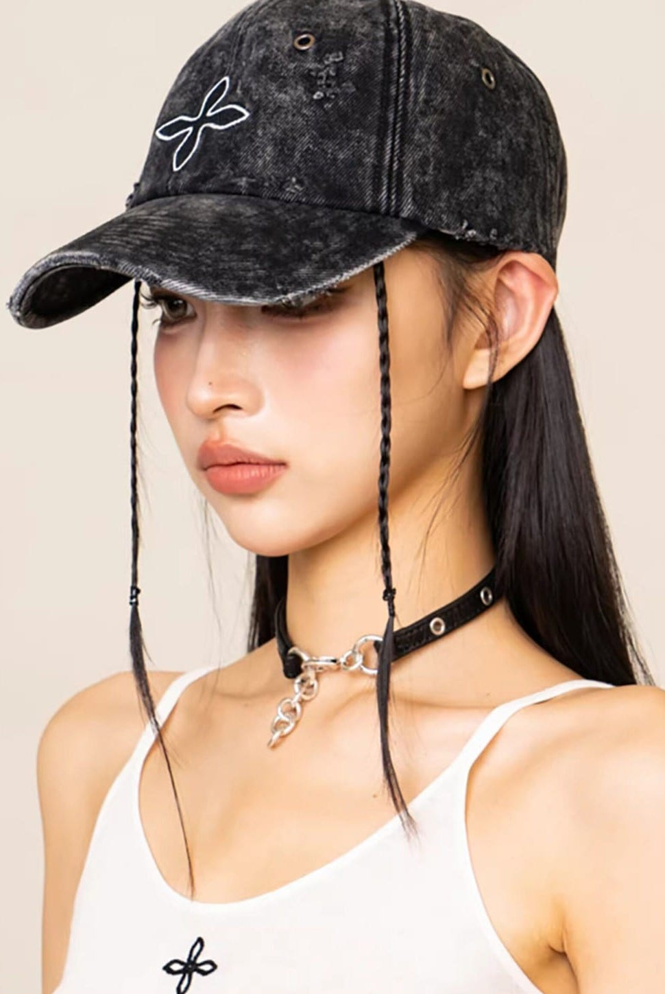 SMFK Distressed Cross Embroidered Baseball Cap in Black - On Female Model