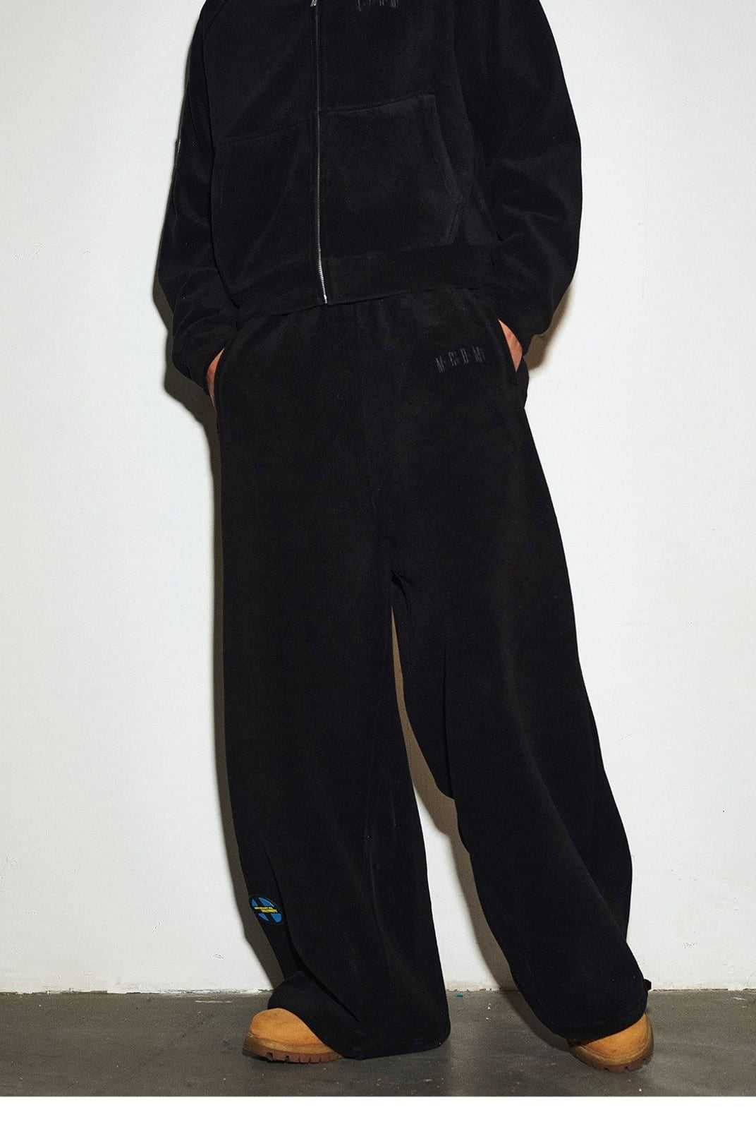 MEDM Polar Fleece Zip Up Hoodie in Black - On Model