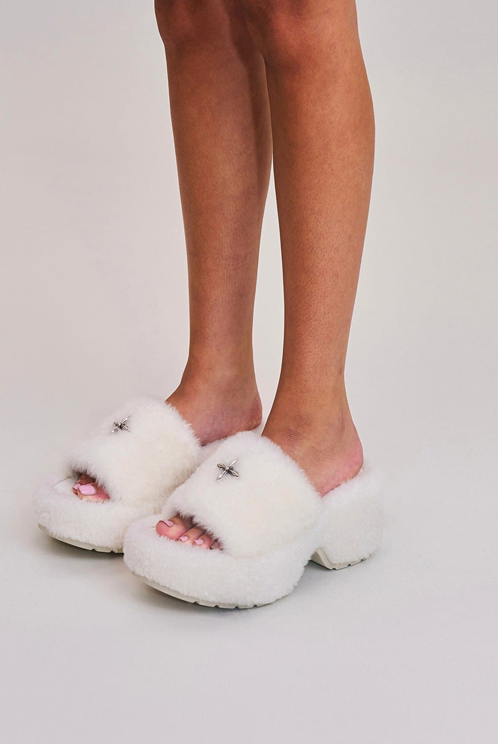 SMFK Cross Hardware Shearling High Heel Mules in White - On Female Model