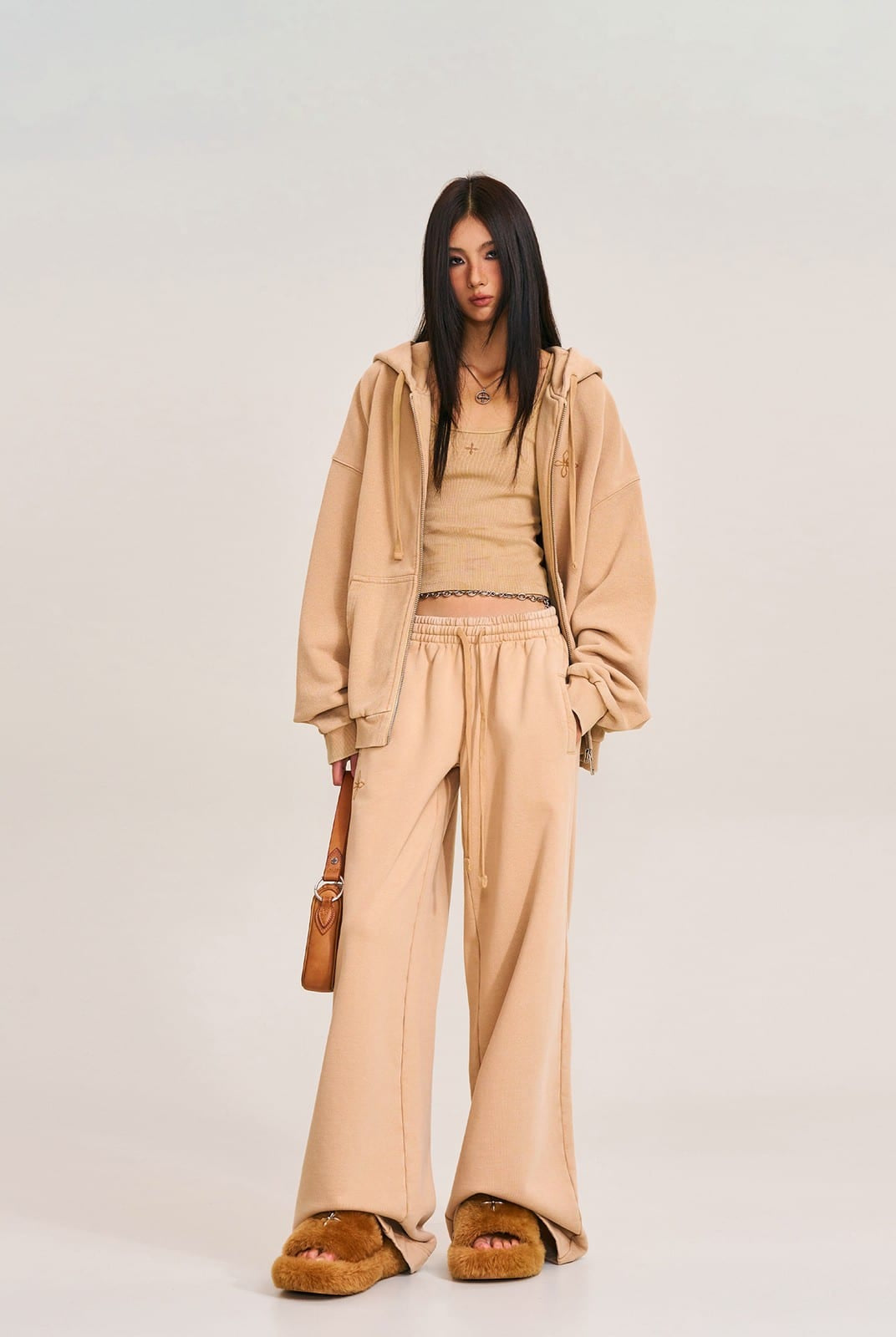 SMFK Cross Embroidered Zip Up Hoodie in Beige - On Female Model