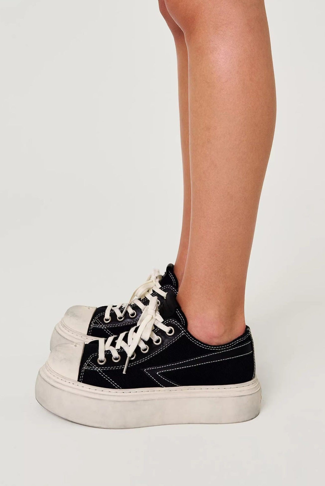 SMFK Distressed Canvas Skate Sneakers in Black - On Model