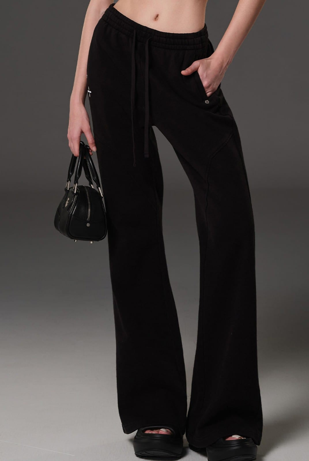 SMFK Cotton Blend Flared Sweatpants in Black - On Female Model
