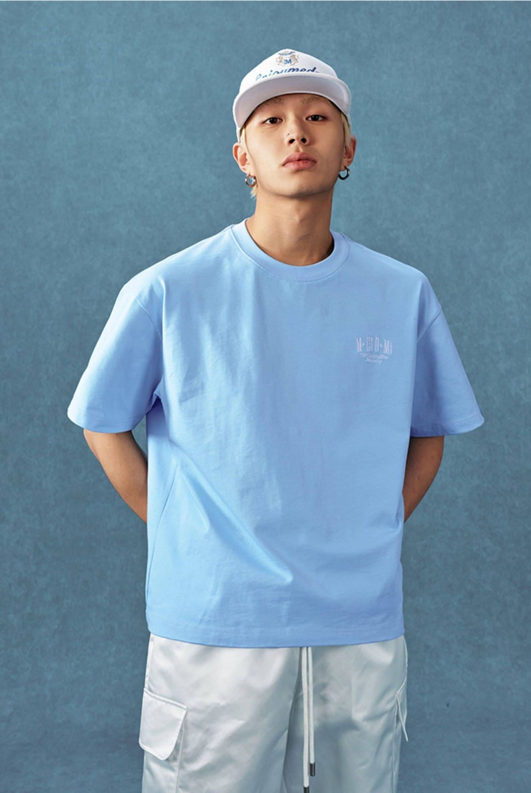 MEDM Letter Embroidery Cotton T Shirt in Sky Blue - On Male Model