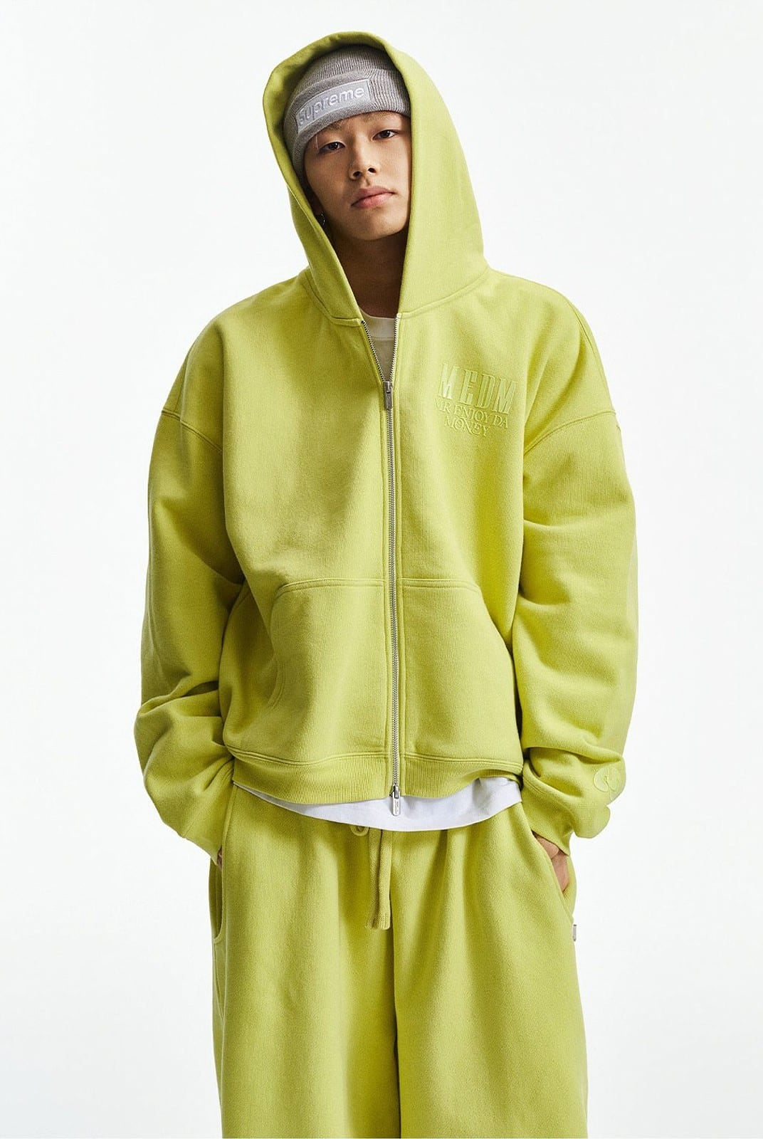 MEDM 3D Logo Two Way Zip Cotton Hoodie in Green - On Male Model