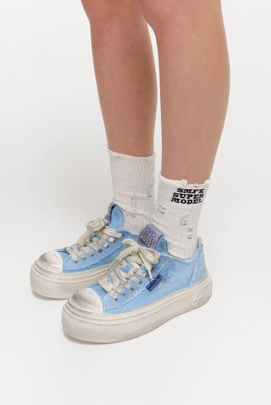 SMFK Distressed Canvas Skate Sneakers in Sky Blue - On Model