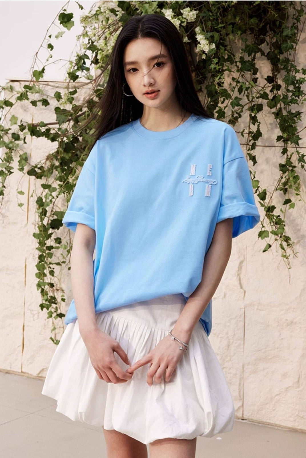 MEDM Tufted Logo Cotton T Shirt in Sky Blue - On Female Model