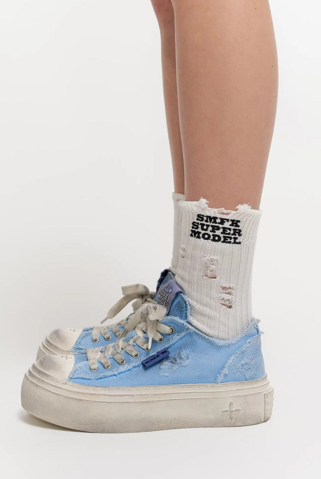 SMFK Distressed Canvas Skate Sneakers in Sky Blue - On Model